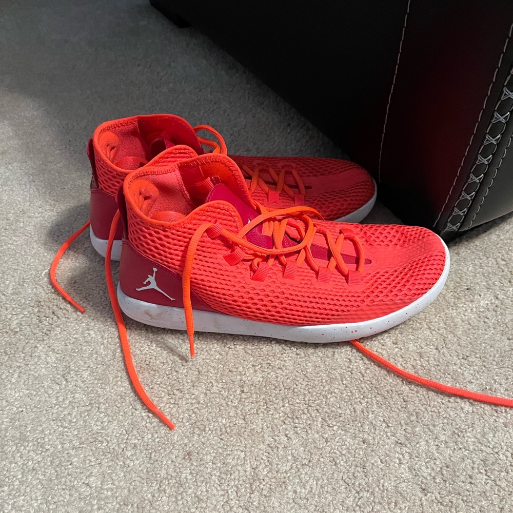 Orangish Red and white weird Jordan’s size 10